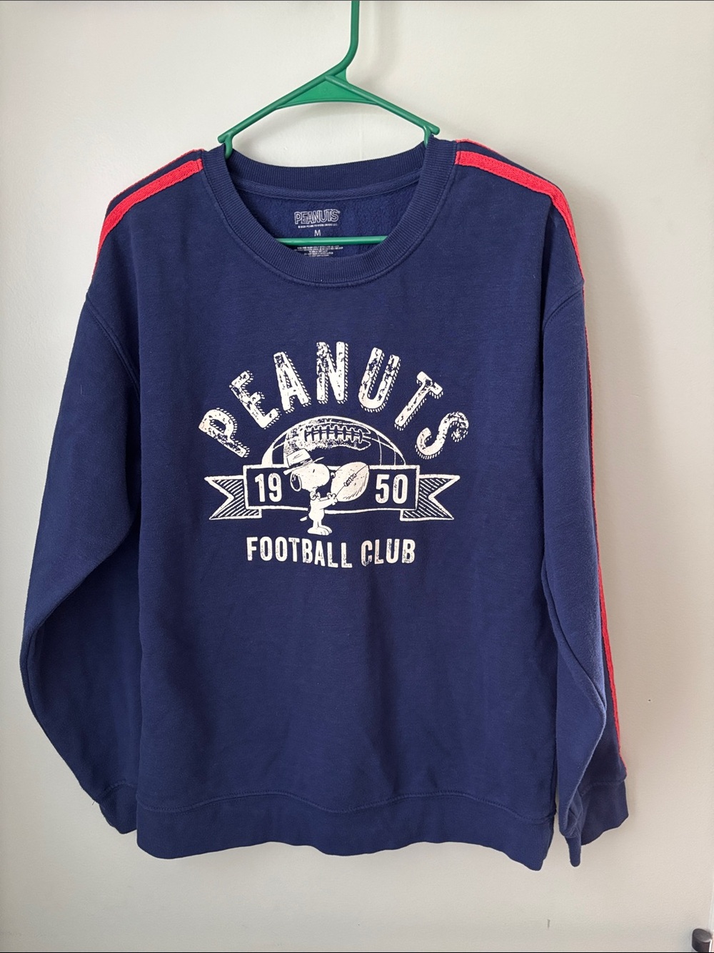 Peanuts Navy Sweatshirt with Red Shoulder Stripes